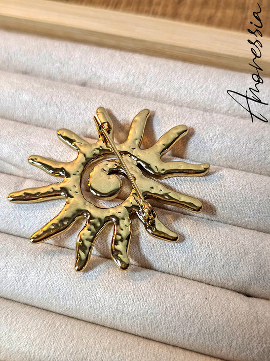Broche soleil