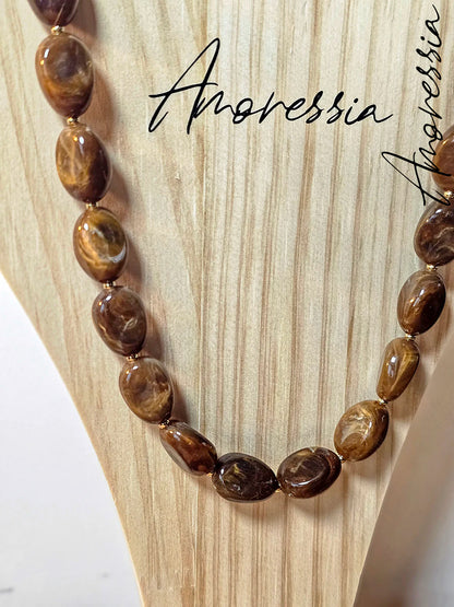 Collier perle marron en résine