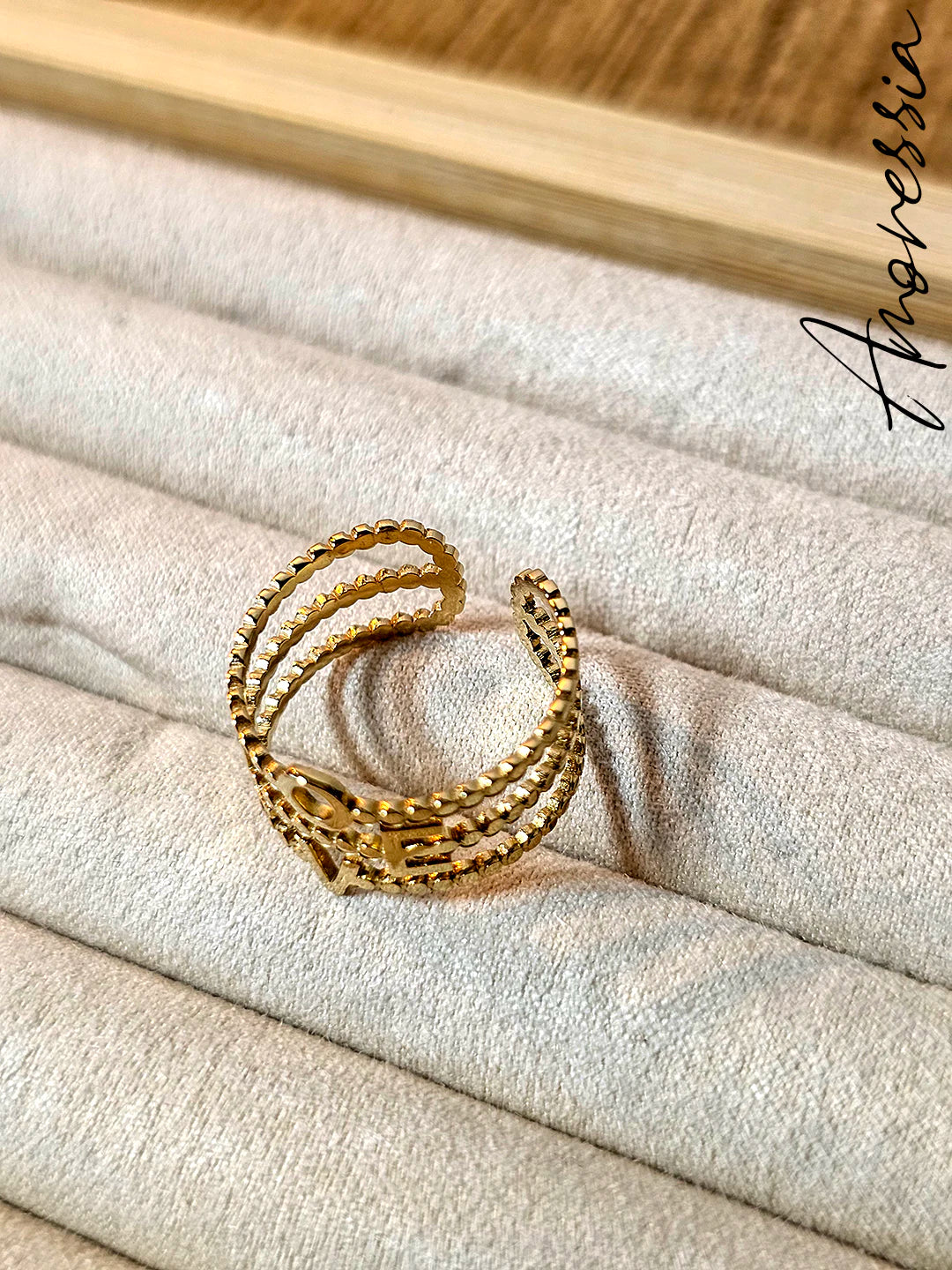Bague triple rang “LOVE” dorée