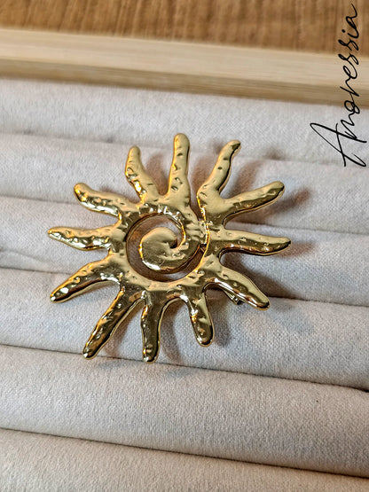 Broche soleil