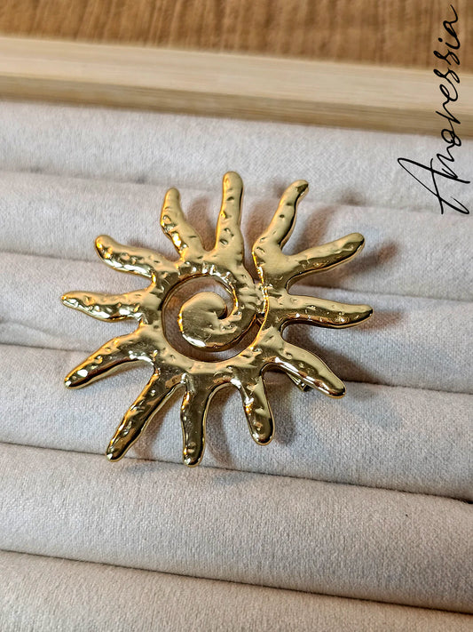 Broche soleil